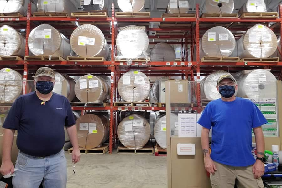 Printpack workers wearing COVID masks