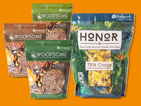 sealable pouches of Woofsome dog treats and Honor 70% cocoa